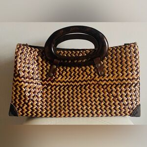 Elegant Woven Handbag with Brown Accents
